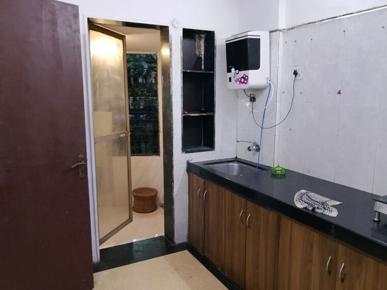Kitchen, serenity-complex 3 Bedroom 1150 Sq.Ft. Apartment In Andheri West Mumbai 10496236