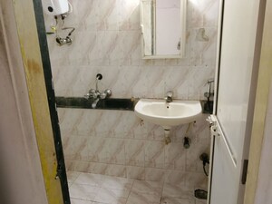 Bathroom in 3 BHK Apartment at Serenity Complex, Andheri West – for Rent