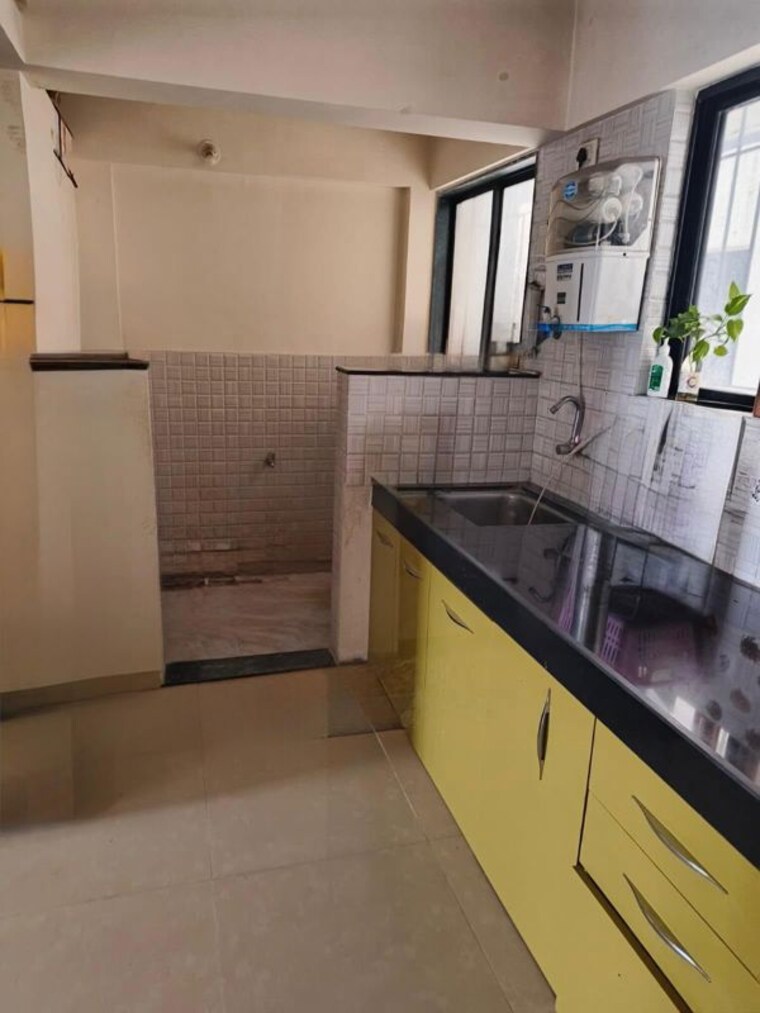 Kitchen, belvalkars-solacia-ii 3 Bedroom 1500 Sq.Ft. Apartment In Wagholi Pune 10496293