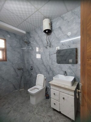 Bathroom in 4 BHK Builder Floor at Sector 52 – for Rent