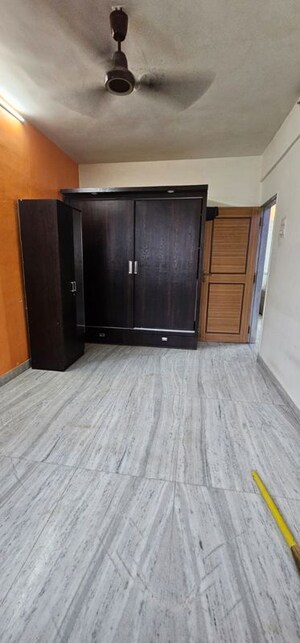 Bedroom in 2 BHK Apartment at Sunder Jamnotri CHS, Malad West – for Rent