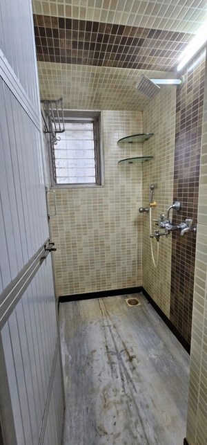 Bathroom in 2 BHK Apartment at Sunder Jamnotri CHS, Malad West – for Rent