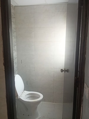 Bathroom in 1 BHK Apartment at Amrapali Dream Valley – for Rent