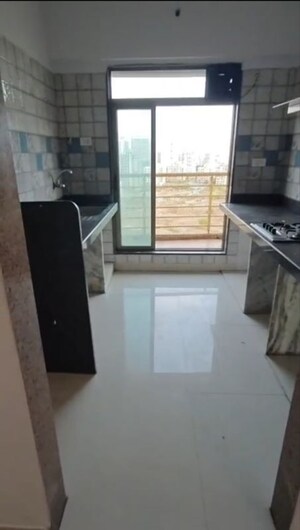 Kitchen in 2 BHK Apartment at Paradise Sai Riverdale, Taloja – for Rent