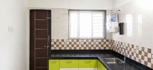 Kitchen in 1 BHK Apartment at Kamgar Putala Vasahat – for Sale