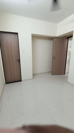 Master Bedroom in 1 BHK Apartment at Oxford Navrang Crystal, Goregaon West – for Rent