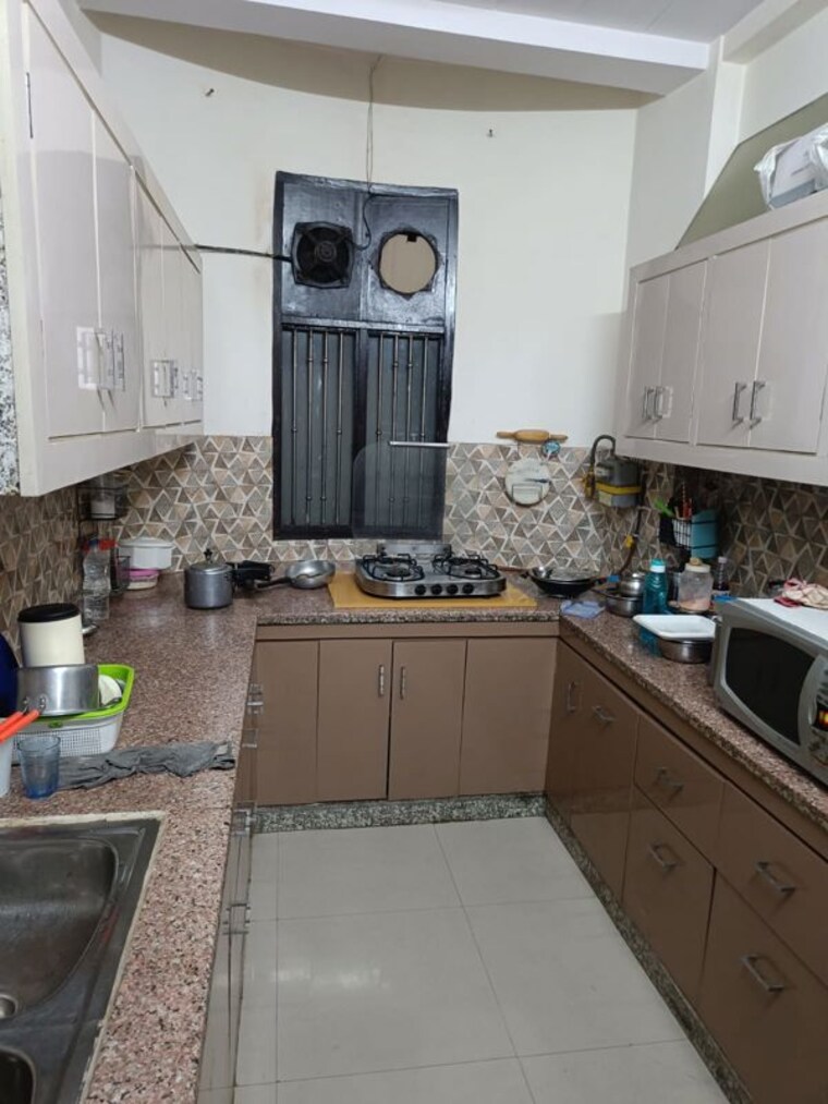 Kitchen, amrapali-village-ii 2 Bedroom 1300 Sq.Ft. Apartment In Nyay Khand Ghaziabad 10496531
