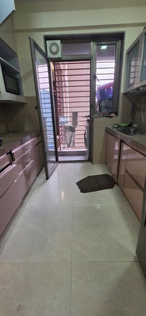 Kitchen in 2.5 BHK Apartment at Neelkanth Greens, Manpada – for Rent
