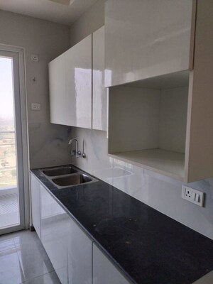 Kitchen in 3 BHK Apartment at T Homes Phase 1, Siddharth Vihar – for Sale
