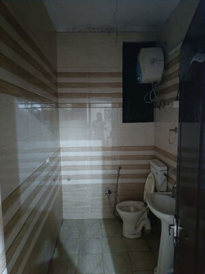Bathroom in 3 BHK Apartment at Mahagun Mansion I and II, Vaibhav Khand – for Sale