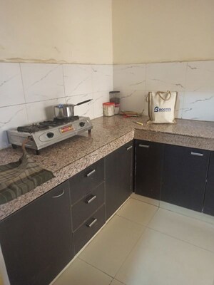 Kitchen in 2 BHK Apartment at Rajhans Apartments, Indrapuram – for Sale