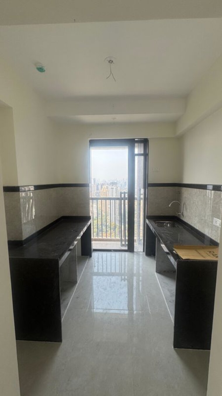 Kitchen, damji-shamji-mahavir-spring-tulip-phase-1 2 Bedroom 720 Sq.Ft. Apartment In Pokhran Road No Two Thane 10496816