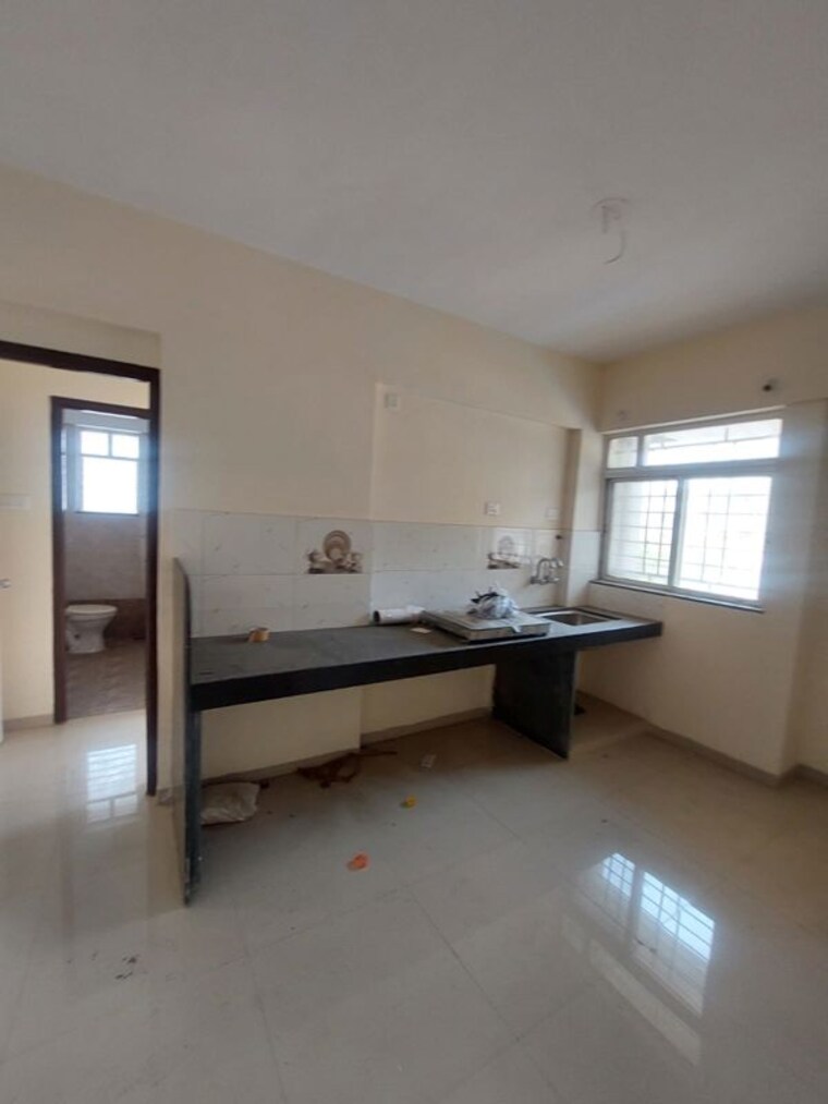 Kitchen, supertech-defence-colony-phase-ii 2 Bedroom 1050 Sq.Ft. Apartment In Wagholi Pune 10496788