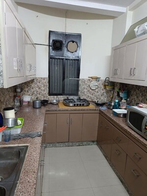 Kitchen in 2 BHK Apartment at Supertech Icon, Ahinsa Khand 2 – for Sale