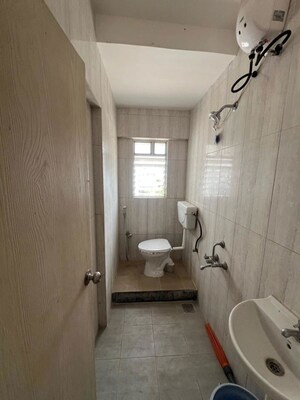 Bathroom in 1 BHK Apartment at Gera Shrishti, Wagholi – for Rent