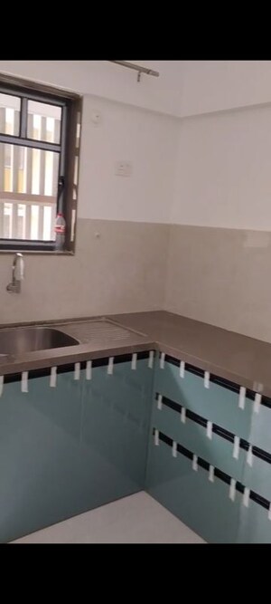 Kitchen in 2 BHK Apartment at ARC Finezza, Pimple Saudagar – for Rent