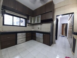 Kitchen in 2 BHK Apartment at New Dindoshi Hill View, Goregaon East – for Rent