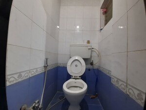Bathroom in 2 BHK Apartment at New Dindoshi Hill View, Goregaon East – for Rent