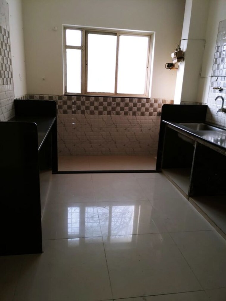 Kitchen, ashray-jagannath-dham 2 Bedroom 1000 Sq.Ft. Apartment In Bavdhan Pune 10497201