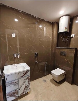 Bathroom in 2 BHK Builder Floor at Chattarpur – for Rent