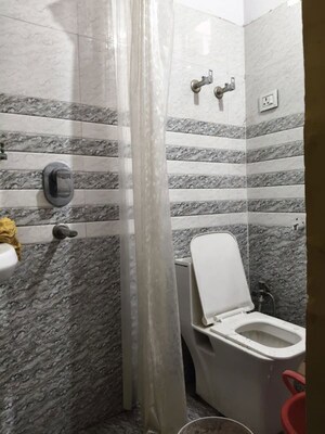 Bathroom in 3 BHK Builder Floor at Mahagun Mahagunpuram II, Lal Kuan – for Rent