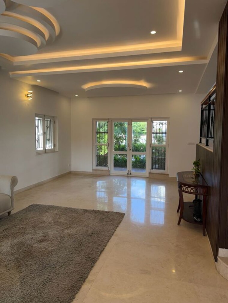 Living Room, prestige-augusta-golf-village-1 4 Bedroom 4500 Sq.Ft. Villa In Kothanur Bangalore 10497277