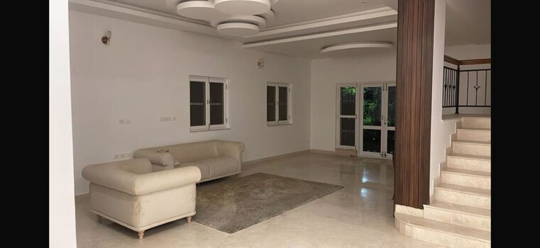 Living Room, prestige-augusta-golf-village-1 4 Bedroom 4500 Sq.Ft. Villa In Kothanur Bangalore 10497277