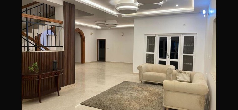 Living Room, prestige-augusta-golf-village-1 4 Bedroom 4500 Sq.Ft. Villa In Kothanur Bangalore 10497277