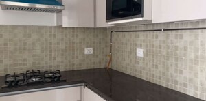 Kitchen in 2 BHK Apartment at Godrej Woods, Sector 43 – for Sale