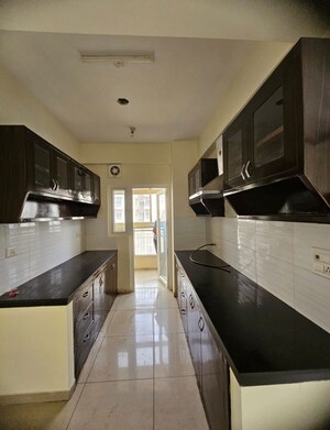 Kitchen in 2.5 BHK Apartment at Gulshan Vivante, Sector 137 – for Rent