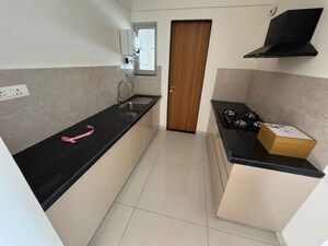 Kitchen in 2 BHK Apartment at Gera Planet Of Joy, Kharadi – for Rent