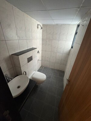Bathroom in 2 BHK Apartment at Gera Planet Of Joy, Kharadi – for Rent