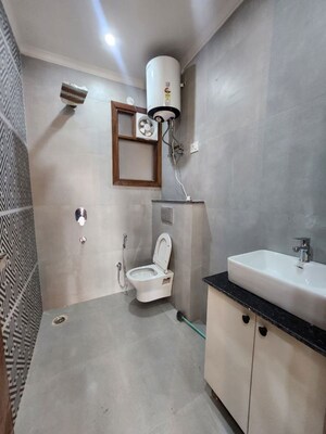 Bathroom in 2 BHK Builder Floor at Freedom Fighters Enclave – for Rent
