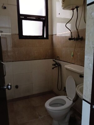 Bathroom in 3 BHK Apartment at Dwarka – for Rent