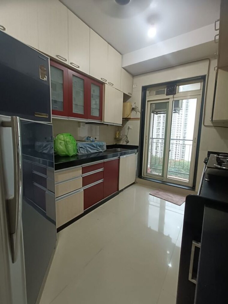 Kitchen, rustomjee-urbania-astraea 2.5 Bedroom 950 Sq.Ft. Apartment In Majiwada Thane 10497479