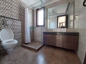 Bathroom in 4 BHK Apartment at Vasant Vihar – for Rent