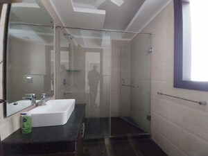Bathroom in 4 BHK Apartment at Vasant Vihar – for Rent
