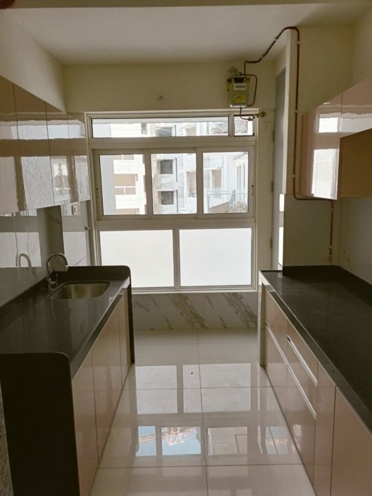 Kitchen, the-wadhwa-atmosphere 2 Bedroom 778 Sq.Ft. Apartment In Mulund West Mumbai 10497698
