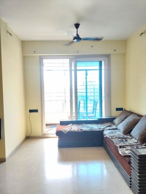 Living Room in 2 BHK Apartment at Vijay Nagari Annex, Waghbil – for Rent