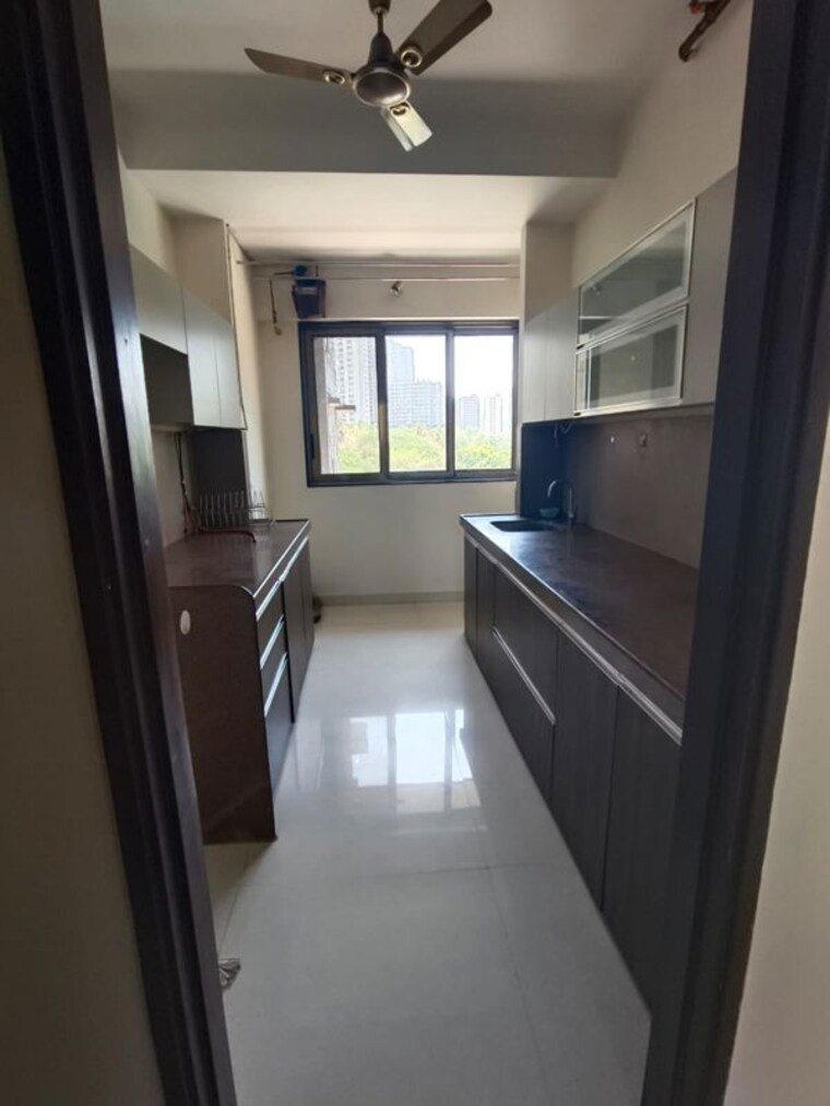 Kitchen, the-wadhwa-atmosphere 2.5 Bedroom 921 Sq.Ft. Apartment In Mulund West Mumbai 10497777