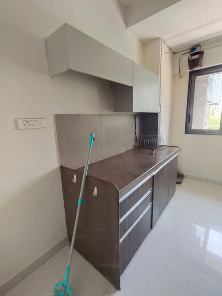 Kitchen, the-wadhwa-atmosphere 2.5 Bedroom 921 Sq.Ft. Apartment In Mulund West Mumbai 10497777