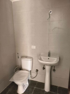 Bathroom in 3 BHK Apartment at Samridhi Luxuriya Avenue, Sector 150 – for Rent