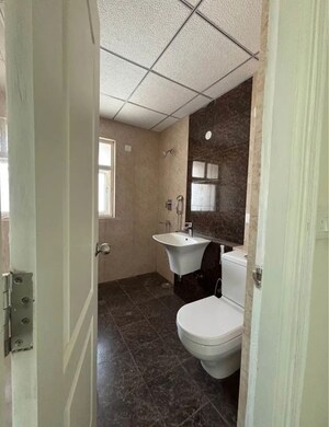 Bathroom in 3.5 BHK Apartment at Shree Vardhman Victoria, Sector 70 – for Rent