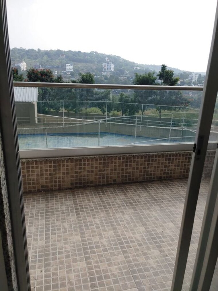 Balcony, mont-vert-belbrook 1 Bedroom 560 Sq.Ft. Apartment In Bhugaon Pune 10498066