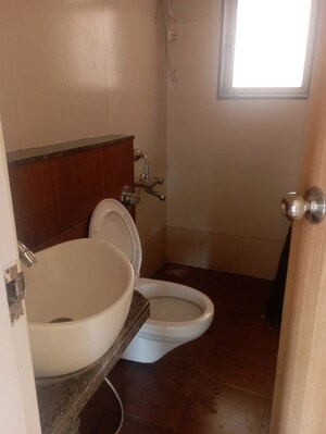 Bathroom in 3 BHK Apartment at Ashish Parkwoods, Ghodbunder Road – for Rent