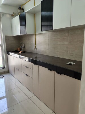 Kitchen in 3 BHK Apartment at Godrej Emerald, Ghodbunder Road – for Rent