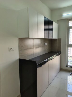 Kitchen in 3 BHK Apartment at Godrej Emerald, Ghodbunder Road – for Rent