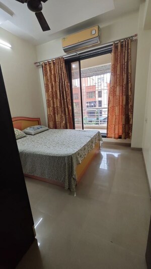 Bedroom in 2 BHK Apartment at BKS Galaxy Orion, Kharghar – for Rent