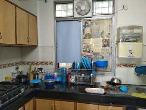 Kitchen in 2 BHK Apartment at Hewo Apartment, Sector 15 – for Rent