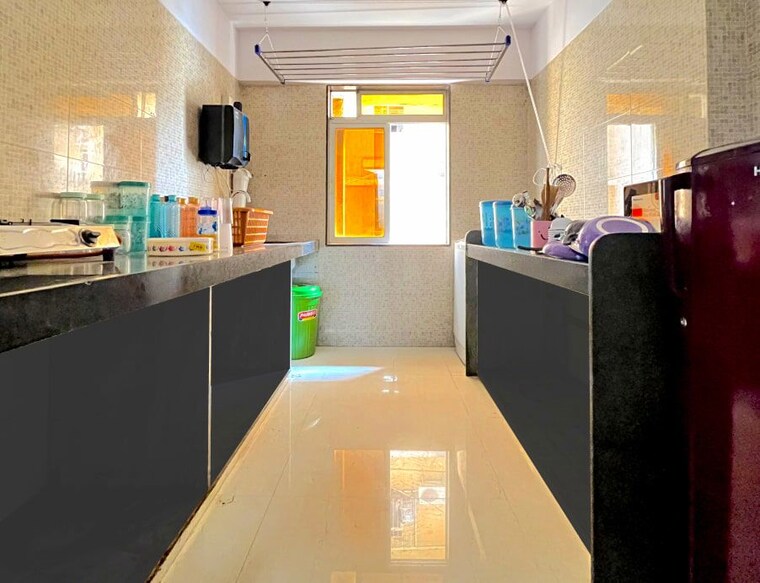 Kitchen, millionaire-heritage 2.5 Bedroom 650 Sq.Ft. Apartment In Andheri West Mumbai 10497663